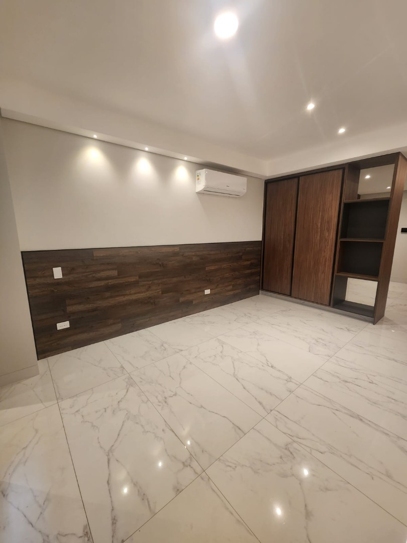 Departamento Luxe Suites calle 8 este Equipetrol Foto 10